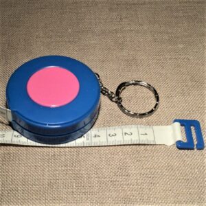 Ruban centimètre bleu enrouleur couture automatique 150 cm avec porte clé