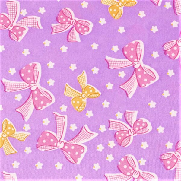 Tissu mauve avec des noeuds 7,90€ le mètre, vendu au mètre