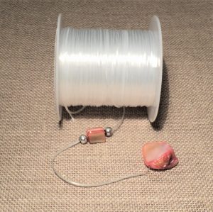 Fil élastique pour bracelets et colliers 0.5mm transparent-blanc