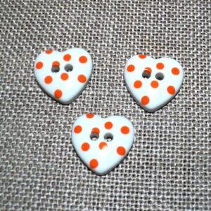 Bouton cœur blanc à pois orange 15mm avec 2-trous