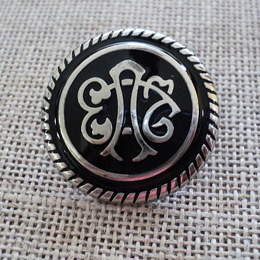 Bouton blason métal argenténoir 23mm à pied pour blazer, veste, gilet